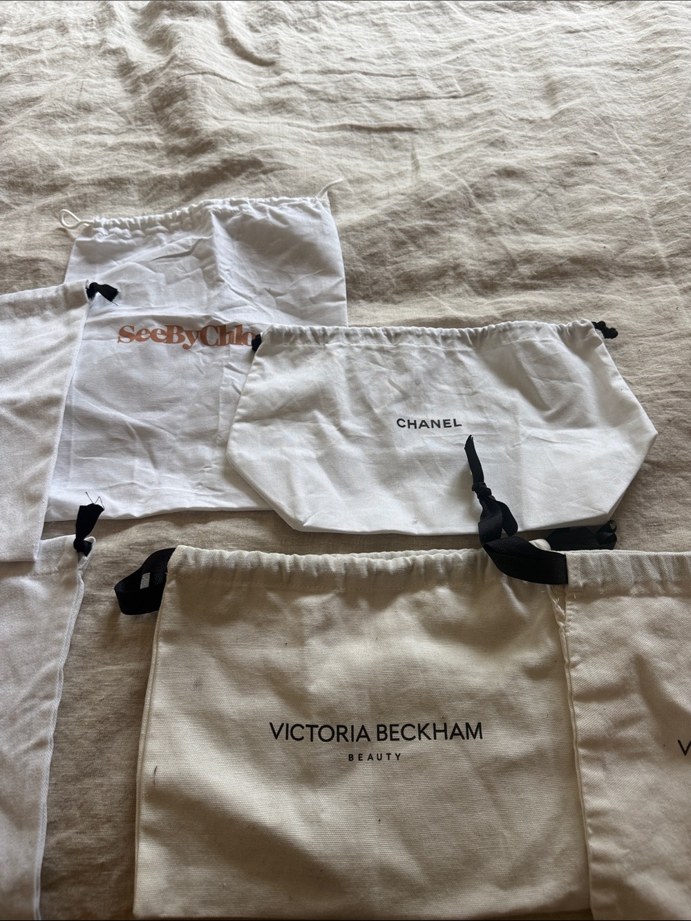 Set of cotton dust bags. Various brands